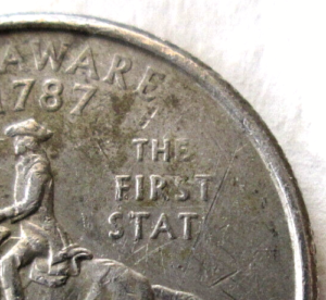 1999P Delaware Quarter Missing Letter Error Coin