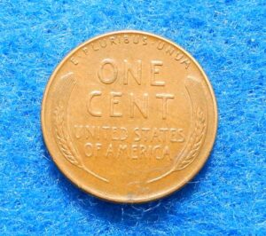 1957-P Lincoln Wheat Cent "BIE" Die Chip Error Coin