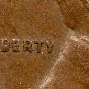 1957-D Lincoln Wheat Cent Die Chip Error Coin