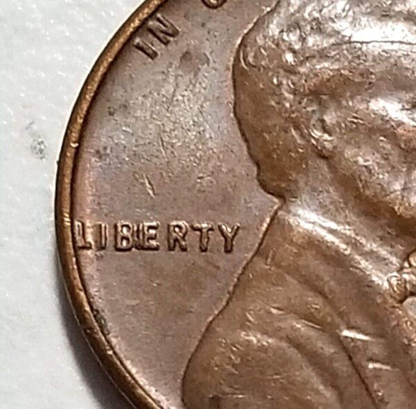 1957-P Lincoln Wheat Cent "BIE" Die Chip Error Coin