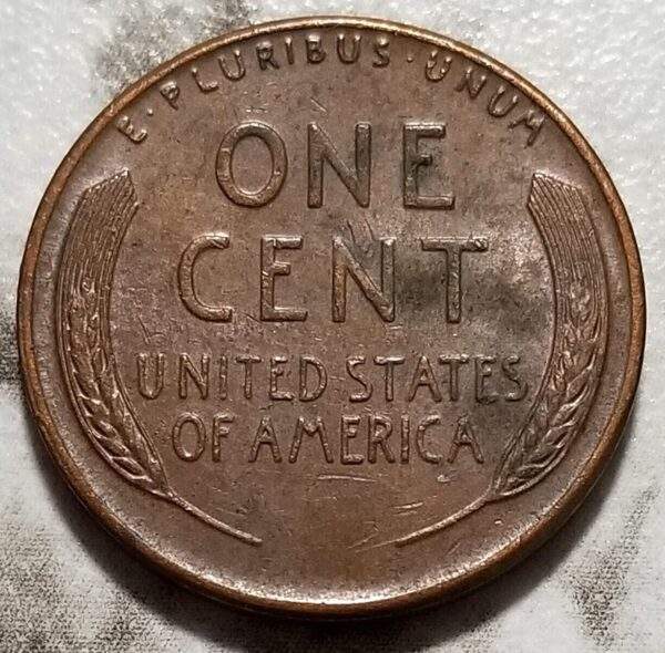 1957-P Lincoln Wheat Cent "BIE" Die Chip Error Coin