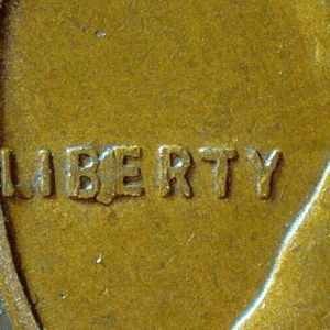 Mint Error Coin: 1957-D Lincoln Wheat Cent, "BIE" Die Chip