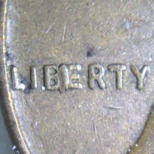 1957-P Lincoln Wheat Cent "BIE" Die Chip Error Coin