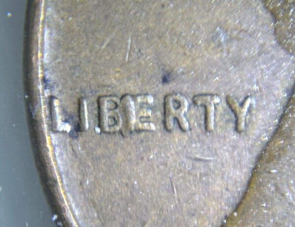 1957-P Lincoln Wheat Cent "BIE" Die Chip Error Coin