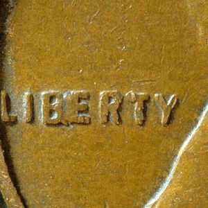 1957-D Lincoln Wheat Cent "BIE" Die Chip Error Coin